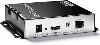 A sleek hardware IPTV encoder device panel showing input configuration options including HDMI IN, Audio IN, LAN port, and a DC 12V power supply connection.